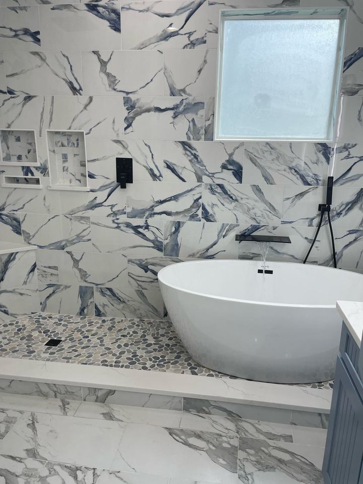 Wet room wide view with step and vanity